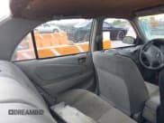 ✅ 1999 Toyota Corolla VE • VIN: 1NXBR12E2XZ214726 • Lot: 43005806. Listed on IAAI with 295,368 mi. Free auction sales archive from the USA and detailed vehicle history report at DreamBid. Image 8.