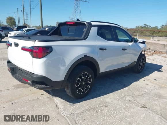 ✅ 2022 Hyundai Santa Cruz SEL • VIN: 5NTJC4AE2NH032425 • Лот: 41734794. Размещён на IAAI с пробегом 12 808 миль миль. Получите бесплатный доступ к архиву аукционных продаж из США и посмотрите подробный отчёт об истории автомобиля на DreamBid. Изображение 4.