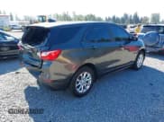 ✅ 2021 Chevrolet Equinox LS • VIN: 2GNAXSEV0M6105190 • Lot: 42848949. Listed on IAAI with 121,375 mi. Free auction sales archive from the USA and detailed vehicle history report at DreamBid. Image 4.