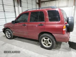 ✅ 1999 Suzuki Vitara JX • VIN: 2S3TD52V4X6110057 • Lot: 87752215. Wystawiony na Copart z przebiegiem 245 419 mil. Bezpłatny archiwum sprzedaży aukcyjnych z USA i szczegółowy raport historii pojazdu na DreamBid. Zdjęcie 2.