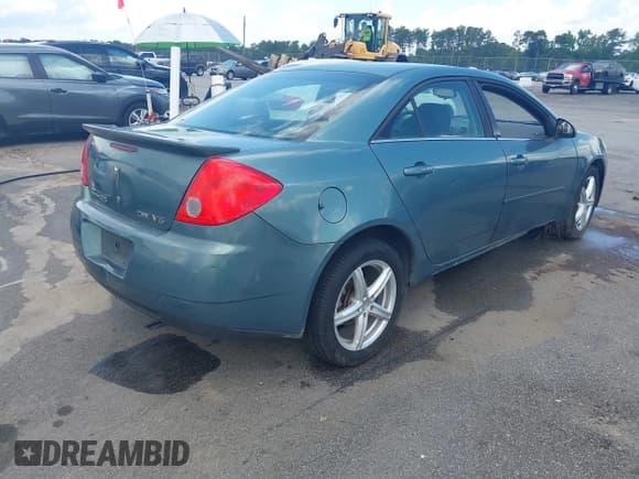 ✅ 2009 Pontiac G6 1SB • VIN: 1G2ZJ57K594255438 • Лот: 42469358. Опубликован ранее на IAAI с пробегом 271 832 миль. Бесплатный доступ к архиву аукционных продаж из США и подробный отчёт об истории автомобиля на DreamBid. Изображение 4.