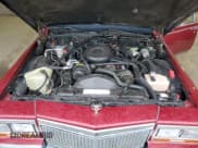 ✅ 1987 Cadillac Brougham • VIN: 1G6DW51Y8H9760303 • Lot: 59555665. Wystawiony na Copart z przebiegiem 34 784 mil. Bezpłatny archiwum sprzedaży aukcyjnych z USA i szczegółowy raport historii pojazdu na DreamBid. Zdjęcie 11.