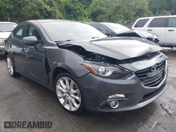✅ 2014 Mazda 3 S Grand Touring • VIN: JM1BM1W37E1107570 • Lot: 42811983. Listed on IAAI with 103,380 mi. Free auction sales archive from the USA and detailed vehicle history report at DreamBid. Image 1.