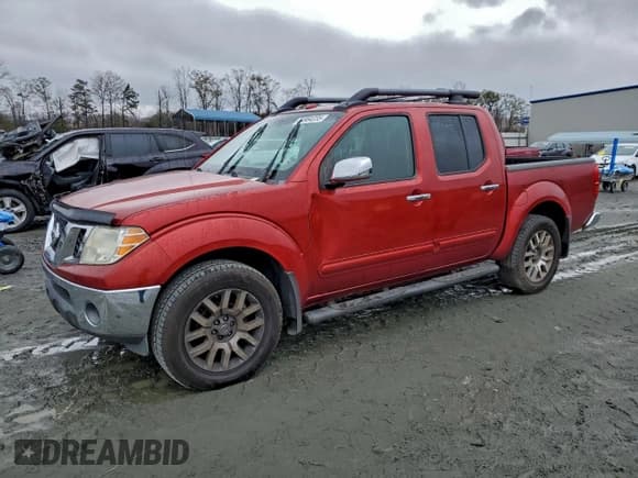 ✅ 2012 Nissan Frontier SV • VIN: 1N6AD0EV0CC411475 • Lot: 94964235. Listed on Copart with 202,923 mi. Free auction sales archive from the USA and detailed vehicle history report at DreamBid. Image 1.