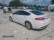✅ 2013 Ford Fusion Titanium • VIN: 3FA6P0SU0DR239890 • Lot: 42745530. Wystawiony na IAAI z przebiegiem 129 458 mil. Bezpłatny archiwum sprzedaży aukcyjnych z USA i szczegółowy raport historii pojazdu na DreamBid. Zdjęcie 3.