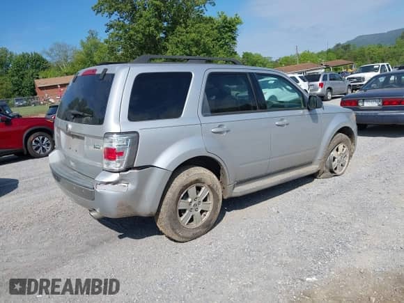 2010 Mercury Mariner with VIN 4M2CN9BG0AKJ21754, listed as a IAAI auction lot 42192286 with 196,749 mi miles and . Bid and sale history available at DreamBid. Image 4.