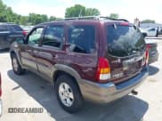 ✅ 2001 Mazda Tribute LX • VIN: 4F2YU081X1KM40012 • Lot: 42569557. Listed on IAAI with 228,754 mi. Free auction sales archive from the USA and detailed vehicle history report at DreamBid. Image 3.