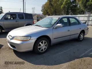 1999 Honda Accord LX z VIN 1HGCG6654XA036455, wystawiony jako Copart lot #80218785 z przebiegiem 172 054 mil mil oraz Szkoda całkowita • Salvage title. Historia ofert i sprzedaży dostępna na DreamBid. Obrazek 1.