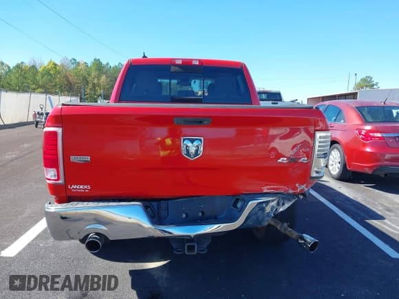 ✅ 2015 Ram 1500 Laramie • VIN: 1C6RR7NT7FS653115 • Lot: 43441542. Listed on IAAI with 148,784 mi. Free auction sales archive from the USA and detailed vehicle history report at DreamBid. Image 17.