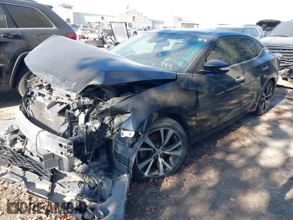 ✅ 2017 Nissan Maxima Platinum • VIN: 1N4AA6AP4HC402104 • Lot: 41132775. Wystawiony na IAAI z przebiegiem 56 775 mil. Bezpłatny archiwum sprzedaży aukcyjnych z USA i szczegółowy raport historii pojazdu na DreamBid. Zdjęcie 17.