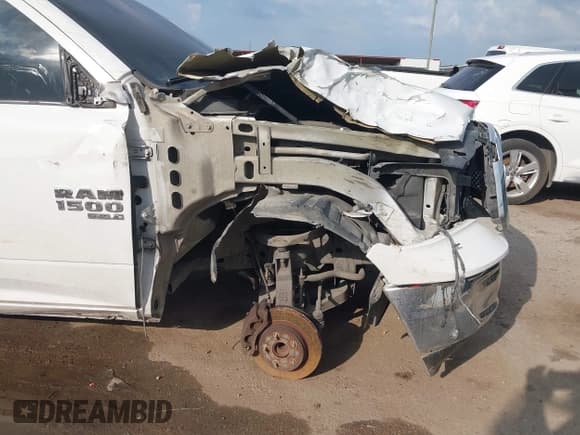 ✅ 2019 Ram 1500 Tradesman • VIN: 1C6RR6FG7KS630276 • Lot: 43049405. Listed on IAAI with 104,053 mi. Free auction sales archive from the USA and detailed vehicle history report at DreamBid. Image 17.