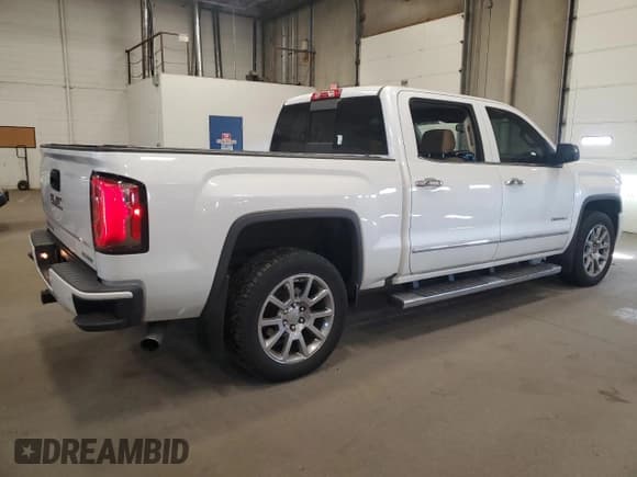 ✅ 2018 GMC Sierra 1500 Denali • VIN: 3GTU2PEC6JG132202 • Лот: 86255295. Опубликован ранее на Copart с пробегом 170 664 миль. Бесплатный доступ к архиву аукционных продаж из США и подробный отчёт об истории автомобиля на DreamBid. Изображение 3.