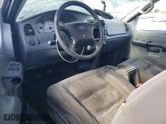 ✅ 2003 Ford Explorer Sport XLS • VIN: 1FMYU60E93UC12832 • Lot: 71596394. Wystawiony na Copart z przebiegiem 197 215 mil. Bezpłatny archiwum sprzedaży aukcyjnych z USA i szczegółowy raport historii pojazdu na DreamBid. Zdjęcie 8.