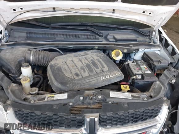 ✅ 2018 Dodge Grand Caravan SE Plus • VIN: 2C4RDGBG2JR192317 • Lot: 43065371. Wystawiony na IAAI z przebiegiem 203 051 mil. Bezpłatny archiwum sprzedaży aukcyjnych z USA i szczegółowy raport historii pojazdu na DreamBid. Zdjęcie 10.