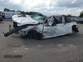 2020 Ram 1500 SLT с VIN 1C6RR7TT5LS119772, выставлен на аукционе Copart как лот 66842975 с пробегом Не указан миль и Списание • Salvage title. История ставок и продаж доступна на DreamBid. Изображение 1.