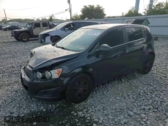 2012 Chevrolet Sonic LT z VIN 1G1JD6SB6C4178155, wystawiony jako Copart lot #68938734 z przebiegiem 176 298 mil mil oraz Szkoda całkowita • Salvage title. Historia ofert i sprzedaży dostępna na DreamBid. Obrazek 11.