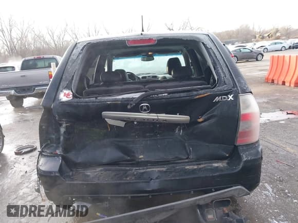 ✅ 2004 Acura MDX Touring • VIN: 2HNYD18634H556160 • Lot: 41396287. Listed on IAAI with 243,292 mi. Free auction sales archive from the USA and detailed vehicle history report at DreamBid. Image 6.