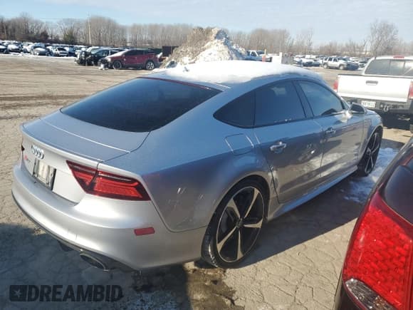 ✅ 2017 Audi RS 7 Prestige • VIN: WUAWAAFC8HN903853 • Lot: 86112964. Wystawiony na Copart z przebiegiem 57 313 mil. Bezpłatny archiwum sprzedaży aukcyjnych z USA i szczegółowy raport historii pojazdu na DreamBid. Zdjęcie 3.