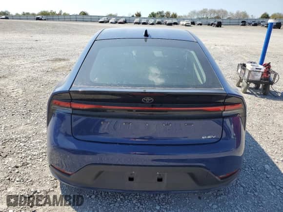 2023 Toyota Prius LE with VIN JTDACAAU6P3004002, listed as a Copart auction lot 80690095 with 58,977 mi miles and Salvage title. Bid and sale history available at DreamBid. Image 6.