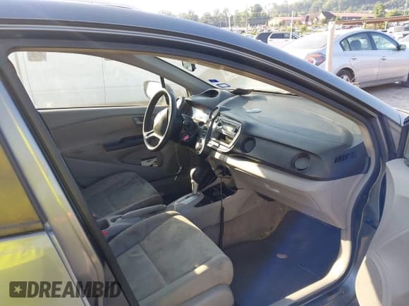 ✅ 2012 Honda Insight • VIN: JHMZE2H37CS006050 • Lot: 42570827. Listed on IAAI with 198,105 mi. Free auction sales archive from the USA and detailed vehicle history report at DreamBid. Image 5.