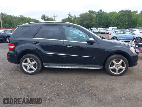 ✅ 2009 Mercedes-Benz M 550 • VIN: 4JGBB72E59A504504 • Lot: 43157447. Listed on IAAI with 99,101 mi. Free auction sales archive from the USA and detailed vehicle history report at DreamBid. Image 13.