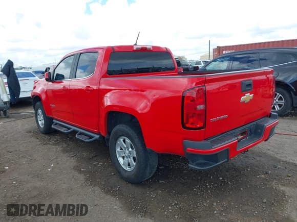 ✅ 2018 Chevrolet Colorado 2WD Work Truck • VIN: 1GCGSBEA1J1256990 • Lot: 41654571. Listed on IAAI with 92,507 mi. Free auction sales archive from the USA and detailed vehicle history report at DreamBid. Image 3.
