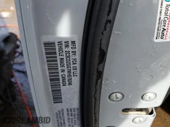 ✅ 2021 Dodge Challenger SXT • VIN: 2C3CDZGG7MH576246 • Lot: 39851153. Wystawiony na Copart z przebiegiem 42 122 mil. Bezpłatny archiwum sprzedaży aukcyjnych z USA i szczegółowy raport historii pojazdu na DreamBid. Zdjęcie 13.