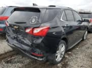 ✅ 2018 Chevrolet Equinox Premier • VIN: 2GNAXVEV1J6141015 • Лот: 84877835. Опубликован ранее на Copart с пробегом Не указан. Бесплатный доступ к архиву аукционных продаж из США и подробный отчёт об истории автомобиля на DreamBid. Изображение 3.