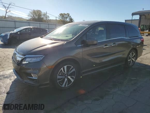 ✅ 2018 Honda Odyssey Elite • VIN: 5FNRL6H98JB097214 • Lot: 87065895. Listed on Copart with 115,569 mi. Free auction sales archive from the USA and detailed vehicle history report at DreamBid. Image 1.
