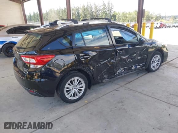 ✅ 2017 Subaru Impreza Premium • VIN: 4S3GTAB64H3740061 • Lot: 43033499. Listed on IAAI with 115,173 mi. Free auction sales archive from the USA and detailed vehicle history report at DreamBid. Image 4.