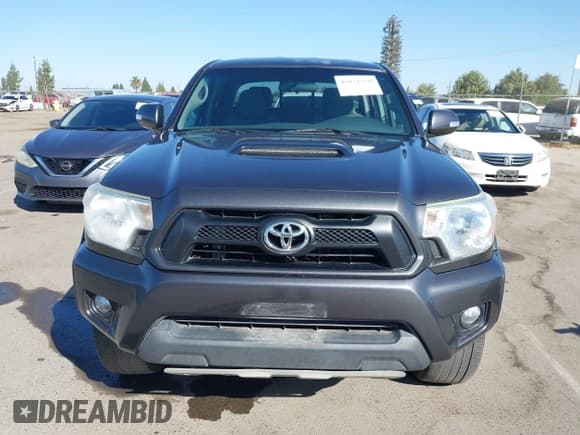 ✅ 2015 Toyota Tacoma PreRunner • VIN: 3TMKU4HN6FM044529 • Lot: 43031258. Listed on IAAI with 167,715 mi. Free auction sales archive from the USA and detailed vehicle history report at DreamBid. Image 12.