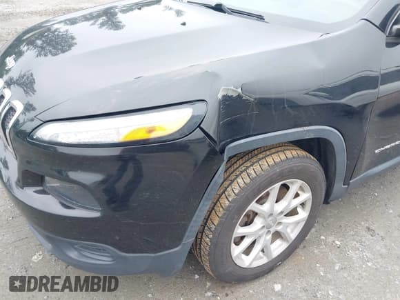 ✅ 2015 Jeep Cherokee Sport • VIN: 1C4PJLAB0FW761467 • Lot: 42362433. Listed on IAAI with 133,794 mi. Free auction sales archive from the USA and detailed vehicle history report at DreamBid. Image 6.