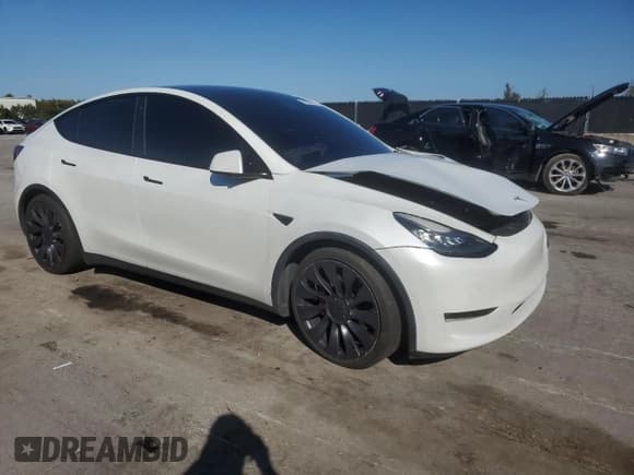 ✅ 2021 Tesla Model Y Performance • VIN: 5YJYGDEFXMF075542 • Lot: 90396705. Listed on Copart with 72,438 mi. Free auction sales archive from the USA and detailed vehicle history report at DreamBid. Image 4.