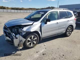 2017 Subaru Forester Limited with VIN JF2SJALC2HH407768, listed as a Copart auction lot 87364875 with 36,703 mi miles and Salvage title. Bid and sale history available at DreamBid. Image 1.