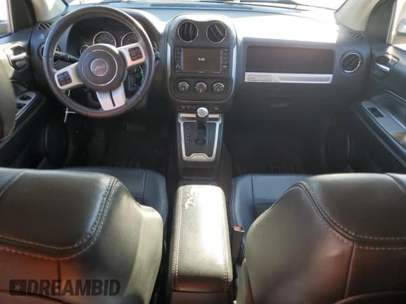✅ 2014 Jeep Compass Latitude • VIN: 1C4NJDEB8ED689130 • Lot: 84581855. Listed on Copart with 140,245 mi. Free auction sales archive from the USA and detailed vehicle history report at DreamBid. Image 8.