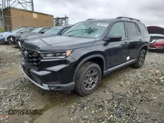 ✅ 2025 Honda Pilot TrailSport • VIN: 5FNYG1H62SB075946 • Лот: 66375525. Опубликован ранее на Copart с пробегом 4 720 миль. Бесплатный доступ к архиву аукционных продаж из США и подробный отчёт об истории автомобиля на DreamBid. Изображение 1.