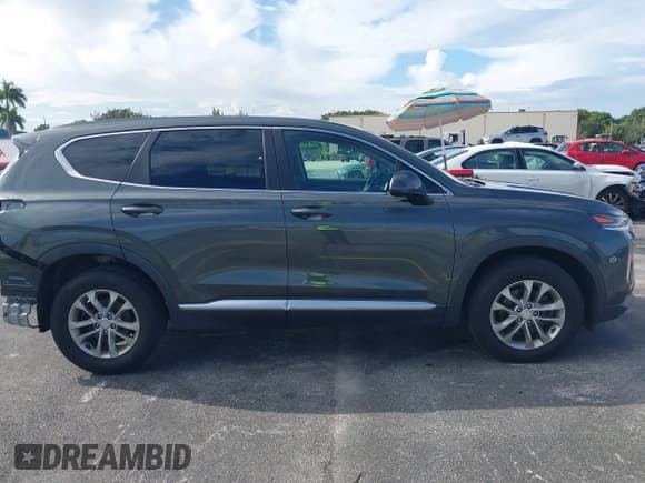 ✅ 2019 Hyundai Santa Fe SE • VIN: 5NMS23AD1KH044131 • Lot: 43237640. Wystawiony na IAAI z przebiegiem 105 619 mil. Bezpłatny archiwum sprzedaży aukcyjnych z USA i szczegółowy raport historii pojazdu na DreamBid. Zdjęcie 14.