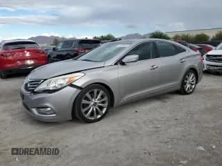 ✅ 2013 Hyundai Azera • VIN: KMHFH4JG8DA274824 • Лот: 81691625. Опубликован ранее на Copart с пробегом 119 855 миль. Бесплатный доступ к архиву аукционных продаж из США и подробный отчёт об истории автомобиля на DreamBid. Изображение 1.