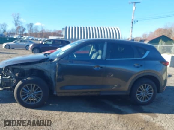 ✅ 2017 Mazda CX-5 Touring • VIN: JM3KFBCL5H0103474 • Lot: 43606272. Wystawiony na IAAI z przebiegiem 124 242 mil. Bezpłatny archiwum sprzedaży aukcyjnych z USA i szczegółowy raport historii pojazdu na DreamBid. Zdjęcie 15.
