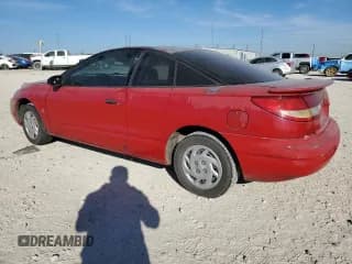 ✅ 2000 Saturn SC • VIN: 1G8ZN1284YZ118197 • Лот: 81569494. Опубликован ранее на Copart с пробегом 254 011 миль. Бесплатный доступ к архиву аукционных продаж из США и подробный отчёт об истории автомобиля на DreamBid. Изображение 2.