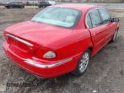 ✅ 2002 Jaguar X-Type • VIN: SAJEA51DX2XC56520 • Lot: 41820250. Listed on IAAI with 105,656 mi. Free auction sales archive from the USA and detailed vehicle history report at DreamBid. Image 4.