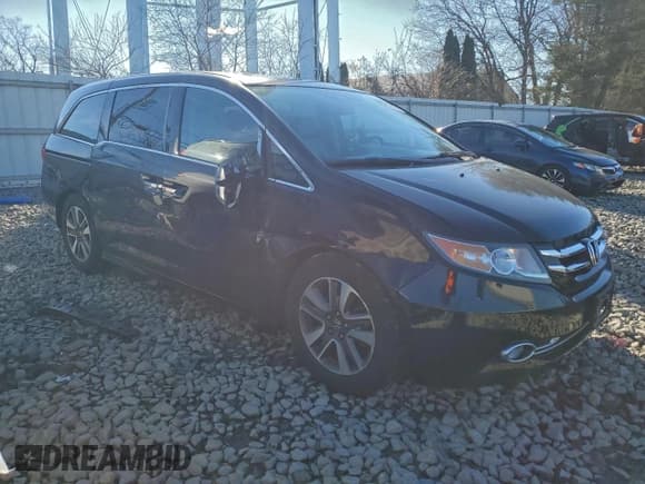 ✅ 2015 Honda Odyssey Touring Elite • VIN: 5FNRL5H93FB111036 • Lot: 93948565. Listed on Copart with 61,703 mi. Free auction sales archive from the USA and detailed vehicle history report at DreamBid. Image 4.