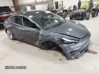 ✅ 2018 Tesla Model 3 Long Range Battery • VIN: 5YJ3E1EB0JF121208 • Lot: 43591911. Listed on IAAI with 77,118 mi. Free auction sales archive from the USA and detailed vehicle history report at DreamBid. Image 1.