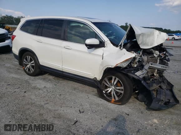 ✅ 2017 Honda Pilot EX-L • VIN: 5FNYF5H79HB013598 • Lot: 62476735. Listed on Copart with Not provided. Free auction sales archive from the USA and detailed vehicle history report at DreamBid. Image 4.