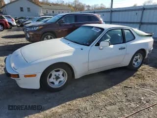 ✅ 1985 Porsche 944 • VIN: WP0AA0946FN473436 • Lot: 77589684. Wystawiony na Copart z przebiegiem 46 913 mil. Bezpłatny archiwum sprzedaży aukcyjnych z USA i szczegółowy raport historii pojazdu na DreamBid. Zdjęcie 1.