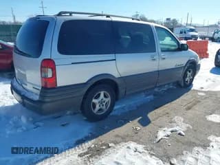 ✅ 2003 Pontiac Montana 1SA • VIN: 1GMDX03E73D124294 • Lot: 41304436. Wystawiony na IAAI z przebiegiem 181 699 mil. Bezpłatny archiwum sprzedaży aukcyjnych z USA i szczegółowy raport historii pojazdu na DreamBid. Zdjęcie 4.