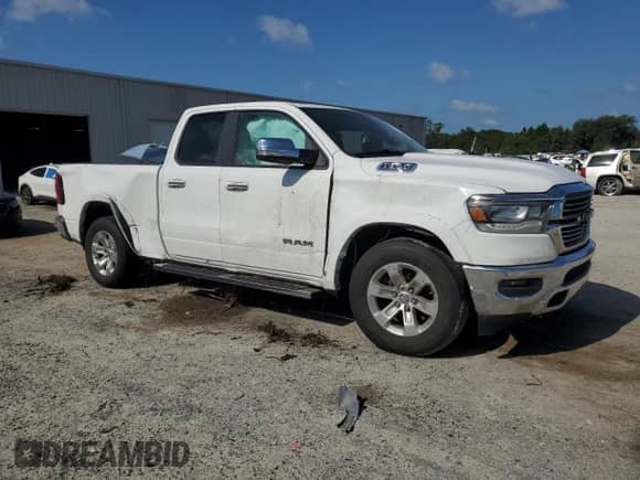 2020 Ram 1500 Laramie with VIN 1C6RREDT3LN262057, listed as a Copart auction lot 69599525 with 124,172 mi miles and Salvage title. Bid and sale history available at DreamBid. Image 4.