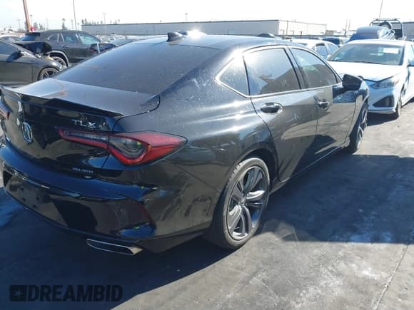 ✅ 2022 Acura TLX w/A-Spec Package • VIN: 19UUB6F52NA001283 • Lot: 41247811. Listed on IAAI with 22,214 mi. Free auction sales archive from the USA and detailed vehicle history report at DreamBid. Image 4.