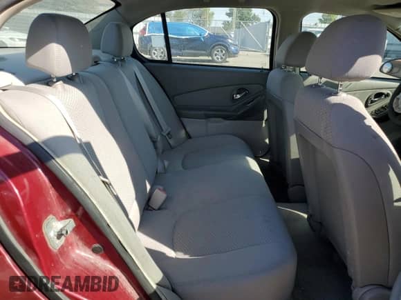 2007 Chevrolet Malibu 1LS z VIN 1G1ZS58FX7F164900, wystawiony jako Copart lot #72260554 z przebiegiem 194 713 mil mil oraz Szkoda całkowita • Salvage title. Historia ofert i sprzedaży dostępna na DreamBid. Obrazek 10.