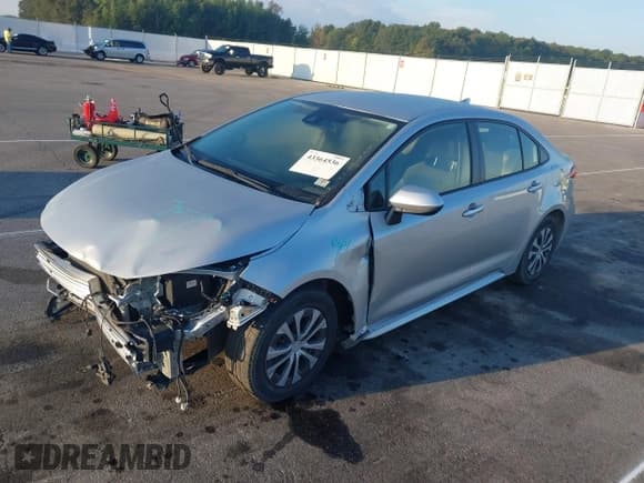 ✅ 2022 Toyota Corolla Hybrid LE • VIN: JTDEAMDE4NJ038915 • Lot: 43364536. Wystawiony na IAAI z przebiegiem 71 262 mil. Bezpłatny archiwum sprzedaży aukcyjnych z USA i szczegółowy raport historii pojazdu na DreamBid. Zdjęcie 18.